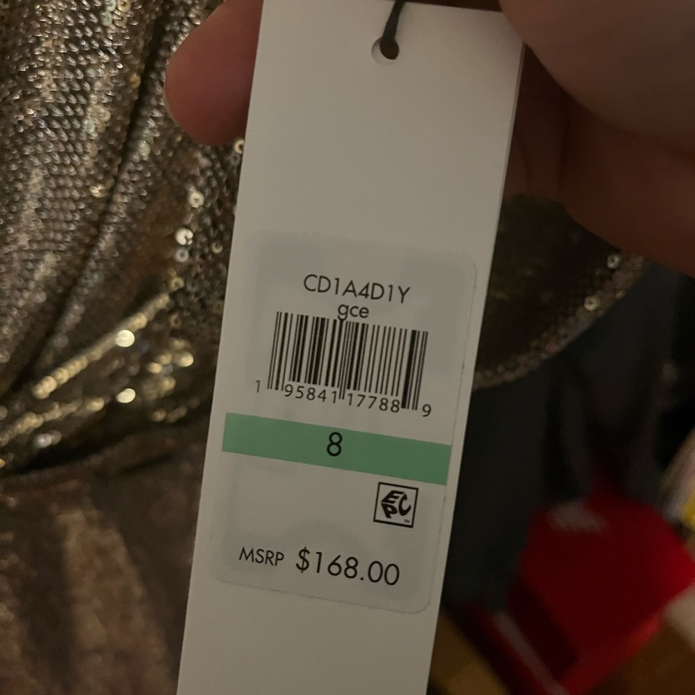 Size 8 Calvin Klein metallic sequin dress, didn’t wear it unfortunately.
